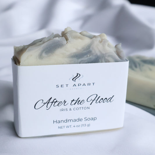 Bar of soap with a white label on a blurred background